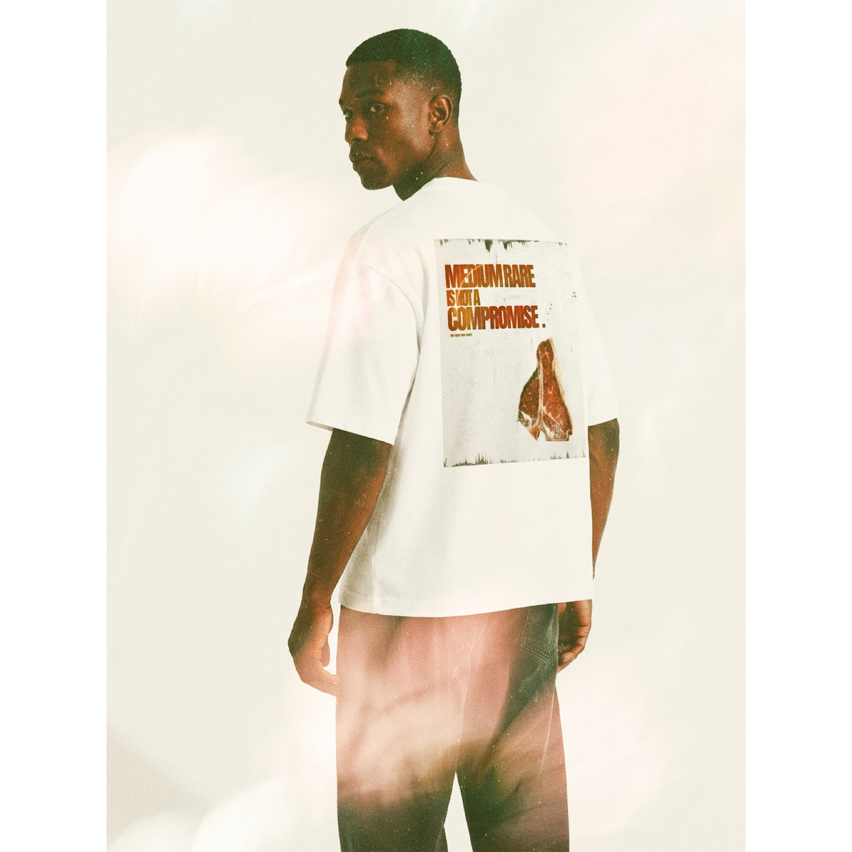Model wearing the BISTECCA oversized backprint T-shirt